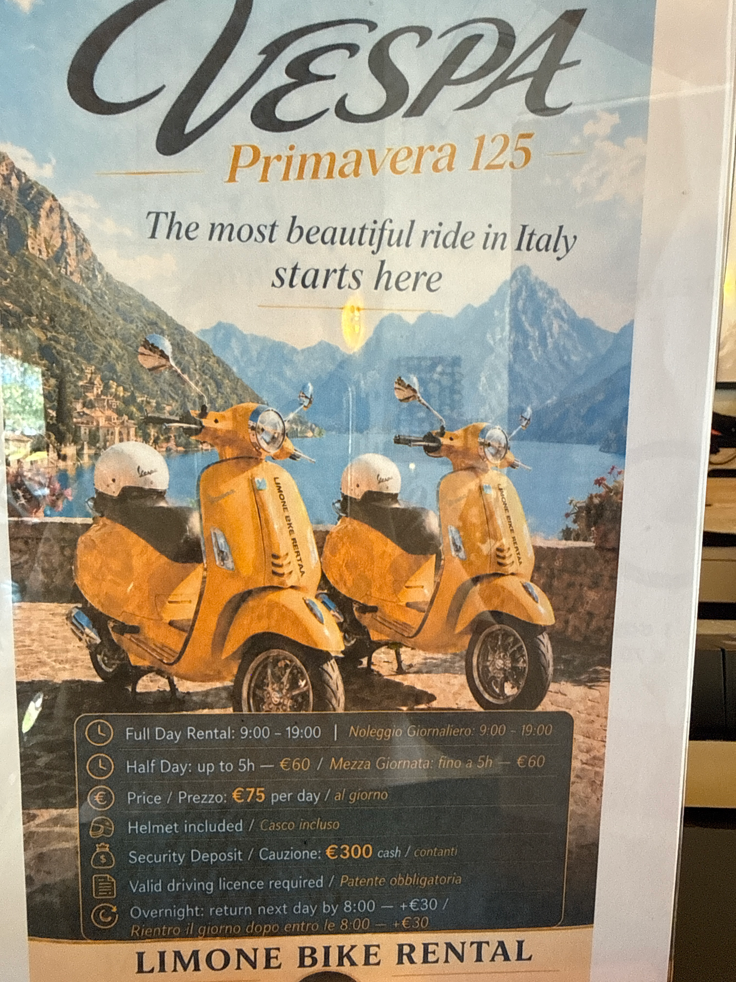 Orange Vespa Primavera 125 available in Limone